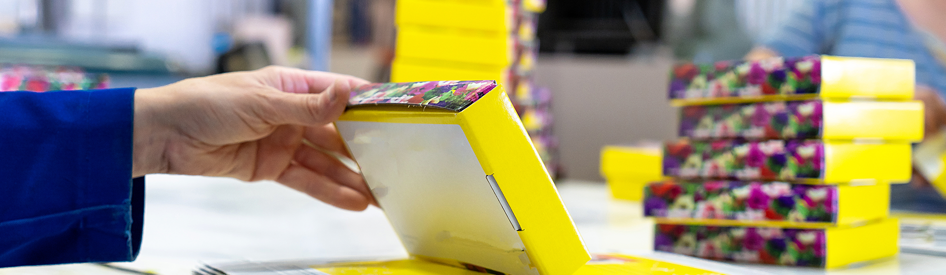 young-female-worker-packing-boxes-shipment-warehouse-1